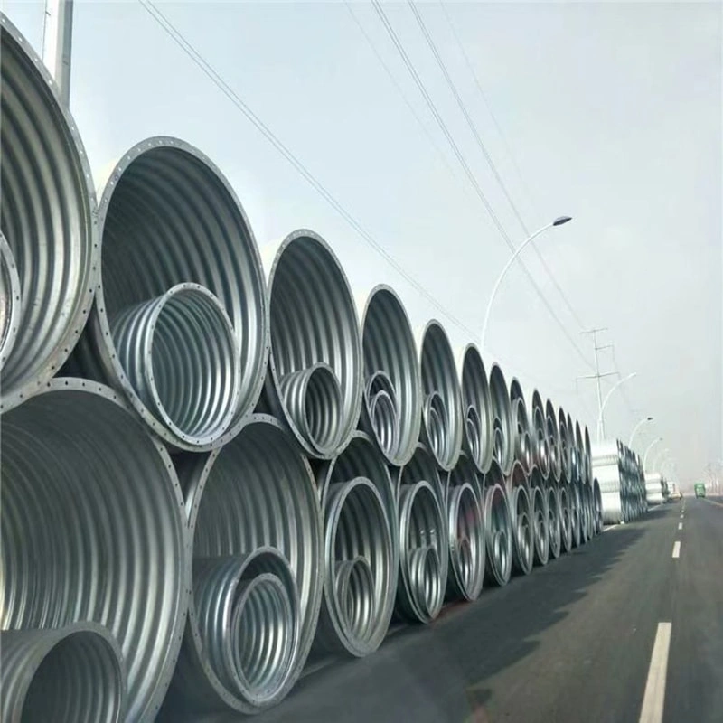 First, the steel plates are carefully inspected upon arrival at the factory. The corrugated steel plates must comply with national regulations, with the waveform and waveform spacing strictly adhering to the design drawings. The length and width are determined based on dimensions, as well as lifting, transportation, and assembly conditions. The corrugated steel pipes, high-strength bolts, and nuts must undergo galvanized anti-corrosion treatment before leaving the factory. Each batch of goods is inspected and accompanied by product certificates.  Second, during the transportation and handling of metal corrugated pipe culverts, extra caution must be exercised. Rolling or impacting hard objects is strictly prohibited to prevent deformation of the corrugated pipe walls or damage to the galvanized layer.  Third, after arriving at the construction site, the dimensions of each piece must be inspected. A random sample of plates and high-strength bolts from the metal corrugated pipe culvert should be selected for testing, including checks on dimensions, corrosion resistance, strength, and other relevant items. The test results must comply with national requirements.  Fourth, after inspection, store the materials in a well-ventilated and spacious area. Protective measures should be taken to prevent the metal corrugated pipes from being soaked by rainwater, which could cause deformation.