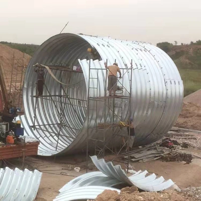 First, the steel plates are carefully inspected upon arrival at the factory. The corrugated steel plates must comply with national regulations, with the waveform and waveform spacing strictly adhering to the design drawings. The length and width are determined based on dimensions, as well as lifting, transportation, and assembly conditions. The corrugated steel pipes, high-strength bolts, and nuts must undergo galvanized anti-corrosion treatment before leaving the factory. Each batch of goods is inspected and accompanied by product certificates.  Second, during the transportation and handling of metal corrugated pipe culverts, extra caution must be exercised. Rolling or impacting hard objects is strictly prohibited to prevent deformation of the corrugated pipe walls or damage to the galvanized layer.  Third, after arriving at the construction site, the dimensions of each piece must be inspected. A random sample of plates and high-strength bolts from the metal corrugated pipe culvert should be selected for testing, including checks on dimensions, corrosion resistance, strength, and other relevant items. The test results must comply with national requirements.  Fourth, after inspection, store the materials in a well-ventilated and spacious area. Protective measures should be taken to prevent the metal corrugated pipes from being soaked by rainwater, which could cause deformation.